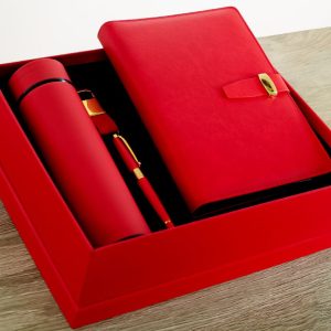 This Executive Gift Set features a sleek and sophisticated leather notebook, complete with a matching pen neatly tucked inside and a thermal mug. The high-quality leather gives the notebook a luxurious feel, making it the perfect accessory for any professional setting.